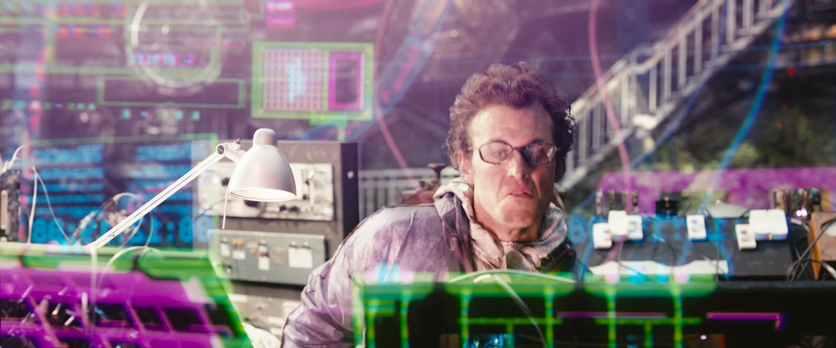 A scientist surrounded by colorful holograms